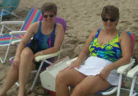 Jane and Sara tat the beach