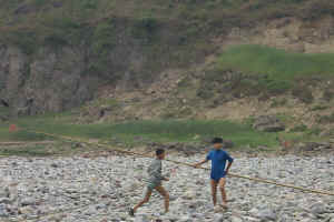 Young Boys Beg Money From Tourists