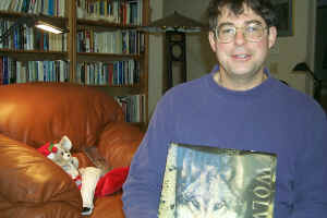 Jon inspects his stocking on Christmas morning