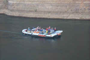 Another group goes by on the river below...