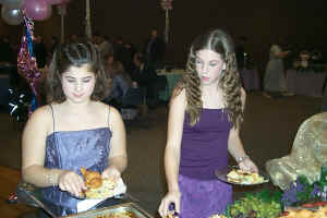 The Sussman Girls check out the food line