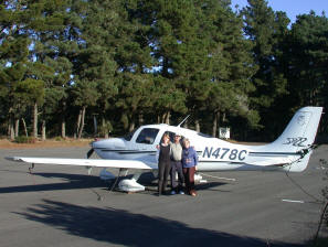 Care, Dad, and Mom with the plane